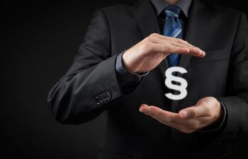 close-up of a man presenting a symbol of a paragraph